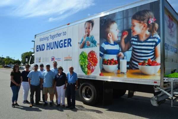 The New Hampshire Food Bank received a new 26-foot, refrigerated truck from Dead River Company, the largest home heating services provider in northern New England, to support the Food Bank’s statewide distribution efforts. Dead River Company has generously supported the Food Bank’s distribution efforts since 2011. Pictured above (left to right) at the truck unveiling: Kayla Dunphe of Dead River Company, Lisa Morrisette, Dead River Company Director of Marketing & Communications, Stephen West of Dead River Company, Eileen Liponis, New Hampshire Food Bank Executive Director, Dana Hook of Dead River Company, Travis Pedley of Dead River Company, Nancy Mellitt, New Hampshire Food Bank Director of Development and Tom Desalvo of Dead River Company.